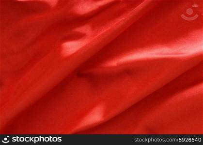Bright satin fabric folded to be used as background