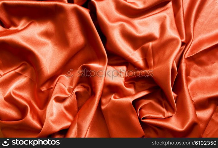 Bright satin fabric folded to be used as background