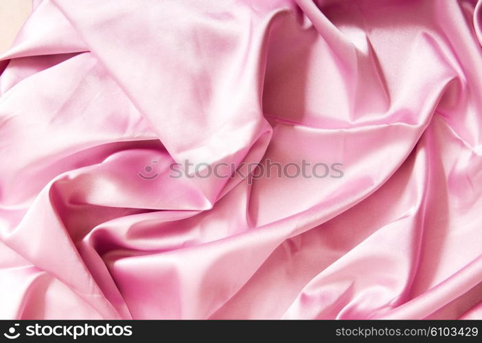 Bright satin fabric folded to be used as background