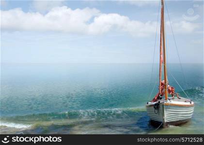 Bright seaside background with sailing boat.