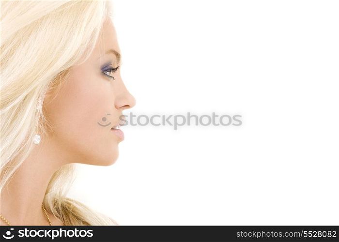 bright sideview picture of lovely blonde in diamond earring