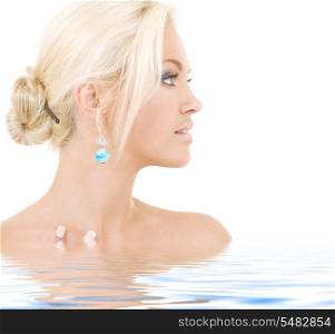 bright sideview picture of lovely blonde in water