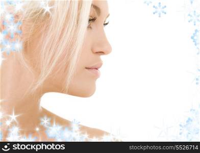 bright sideview picture of lovely blonde with snowflakes