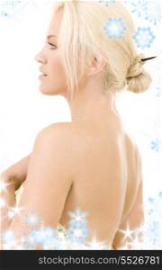 bright sideview picture of lovely blonde with snowflakes