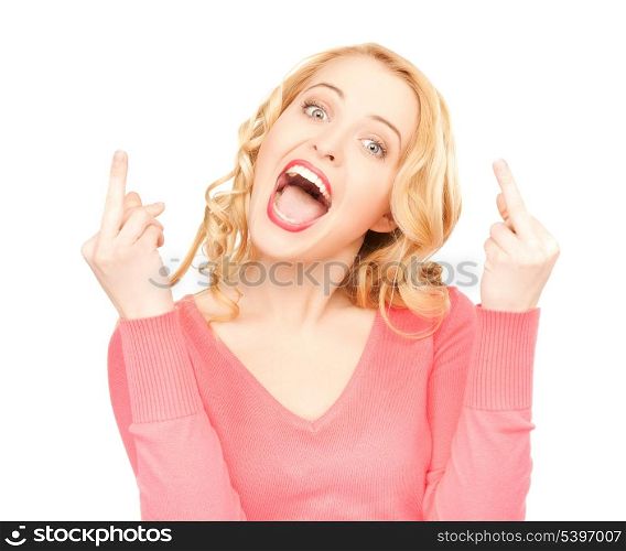 bright studio picture of excited young woman showing middle fingers