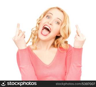 bright studio picture of excited young woman showing middle fingers