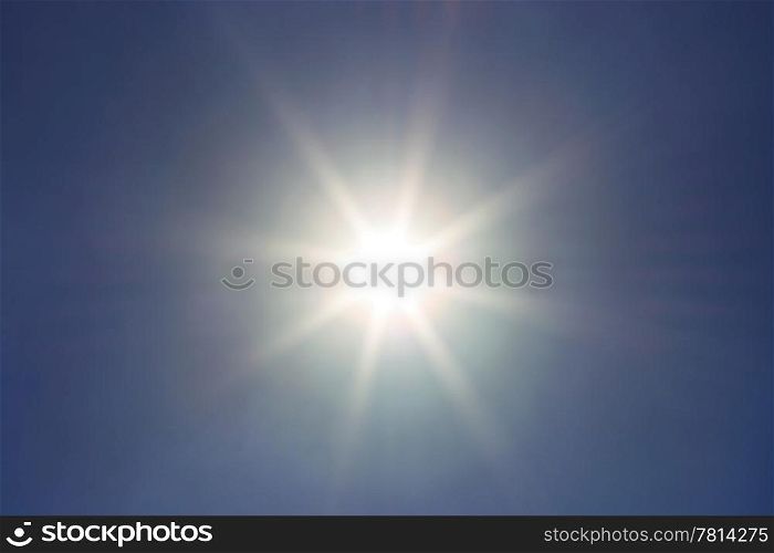 Bright sun in blue sky, background