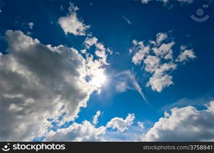 bright sun in the beautiful cumulus clouds
