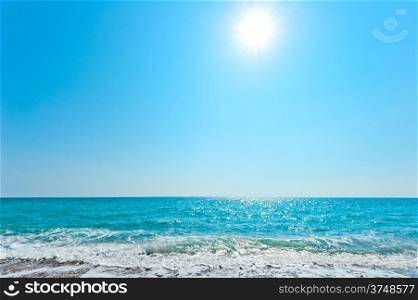 bright sun over blue sea