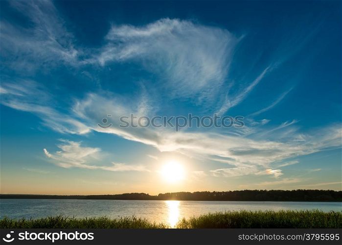 bright sun over the lake and the beautiful sky