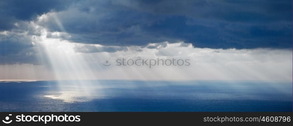 Bright sunlight over ocean, beautiful shine sun beam in sky, abstract blue natural background, peaceful skyscape, open heaven and God, morning sun rays, mediterranean resort, panoramic sea&#xA;
