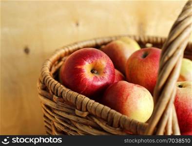 Bright tasty ripe apples in a basket