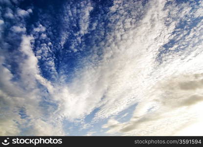 Bright white and dark stormy cumulus clouds