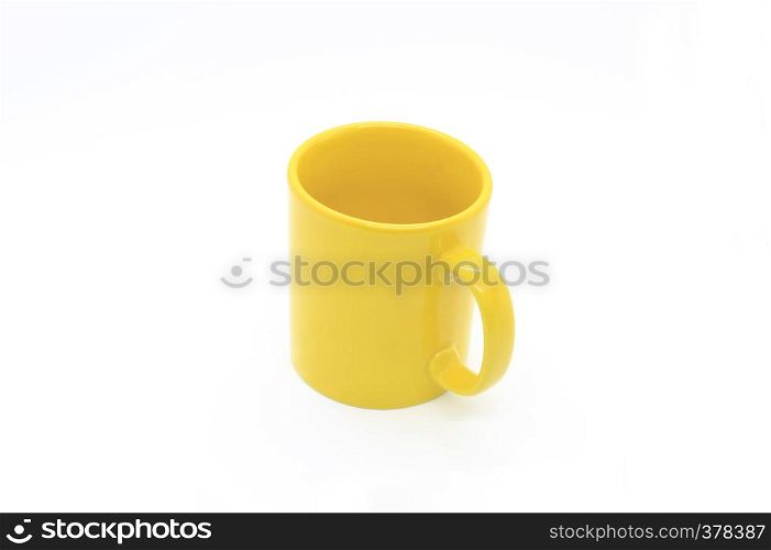 Bright yellow ceramic cup with handle isolated on white background