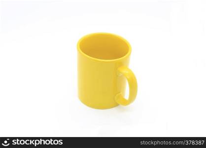 Bright yellow ceramic cup with handle isolated on white background