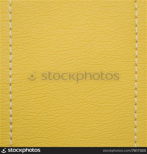 Bright yellow leather texture background with white stitch