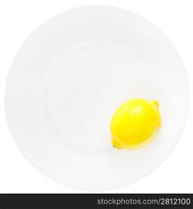 bright yellow lemon on white plate isolated on white background