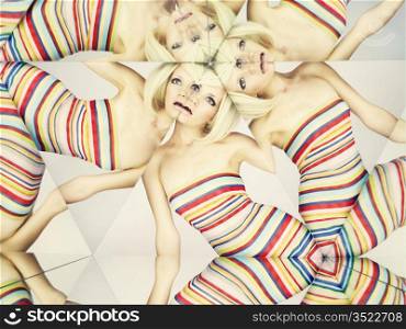 Bright young blonde in kaleidoscope of reflections