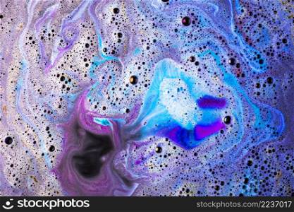 brightly blue pink bath bomb surface backdrop