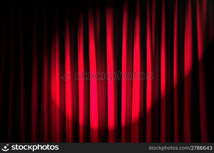 Brightly lit curtains in theatre concept