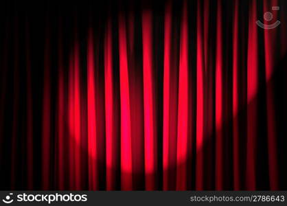 Brightly lit curtains in theatre concept