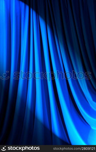 Brightly lit curtains in theatre concept