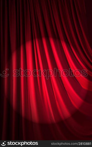 Brightly lit curtains in theatre concept