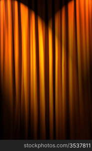 Brightly lit curtains in theatre concept