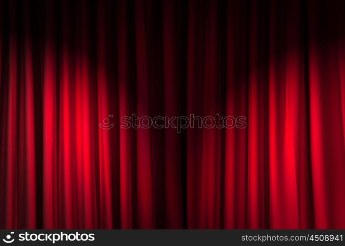 Brightly lit curtains in theatre concept