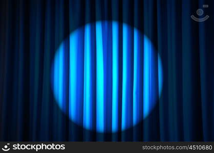 Brightly lit curtains in theatre concept