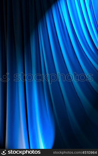 Brightly lit curtains in theatre concept