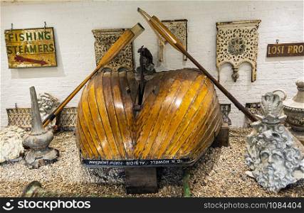Brighton and Hove, East Sussex, UK - November 4, 2019: Part of an old fishing boat inside the brighton fishing museum. Part of an old fishing boat inside the brighton fishing museum