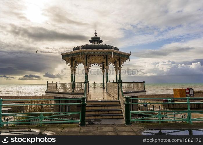 Brighton and Hove, East Sussex, UK - November 4, 2019: The Victorian bandstand near the beach in Brighton, UK.. The Victorian bandstand near the beach in Brighton