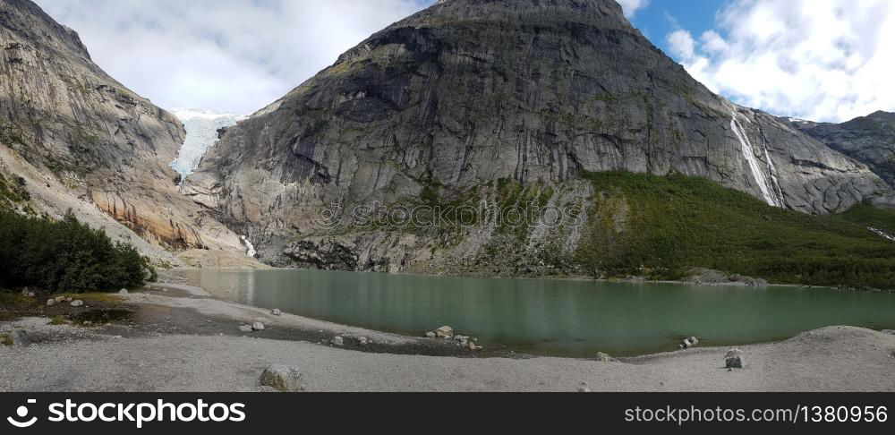 Briksdal glacier with mountain lake at over 1.200 meters enjoying quality time in nature