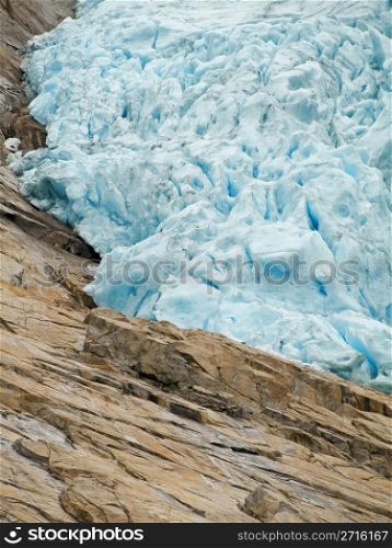 Briksdalsbreen (The Briksdal glacier) is one of the most accessible and best known arms of the Jostedalsbreen glacier. Briksdalsbreen lies on the north side of the Jostedalsbreen, in Briksdalen (the Briks valley), up the Oldedalen in Stryn municipality in the county of Sogn og Fjordane, Norway. It lies in the Jostedalsbreen National Park. Briksdalsbreen terminates in a small glacial lake, Briksdalsbrevatnet, which lies 346 meters above sea level.