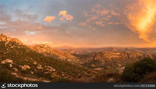 Brilliant sunset near Lakeside in California. Sun setting behind mountains near to Lakeside and Blossom valley in the deserts of southern california. Brilliant sunset near Lakeside in California