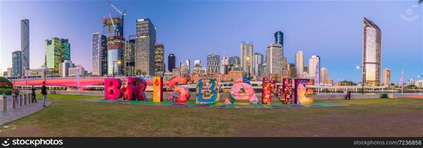 BRISBANE, AUSTRALIA - MAY 21, 2019: Brisbane sign for G20 Cultural Celebrations at South Bank at twilight in Australia
