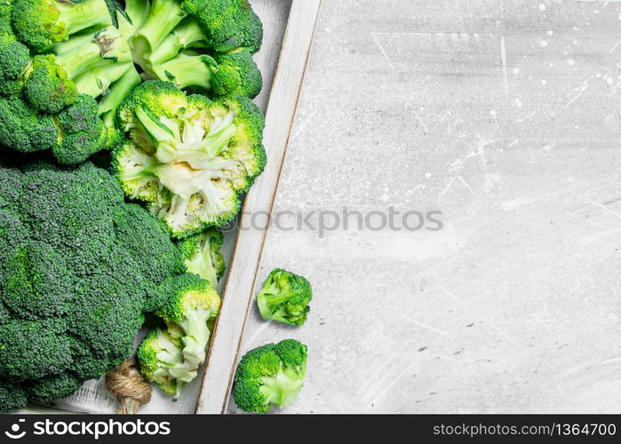 Broccoli on tray. On rustic background. Broccoli on tray.