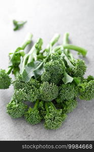 Broccolini. Fresh bunch of broccoli sprouts on a cooking table. Healthy food concept