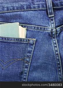 brochure in the back pocket of jeans