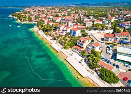Brodarica village near Sibenik beach and coastline aerial view, Dalmatia region of Croatia