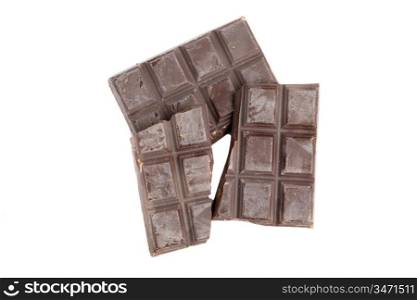 Broken bar of chocolate on a over white background