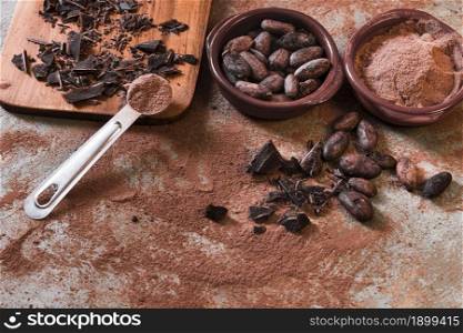 broken chocolate cocoa beans bowl rustic backdrop. Resolution and high quality beautiful photo. broken chocolate cocoa beans bowl rustic backdrop. High quality beautiful photo concept