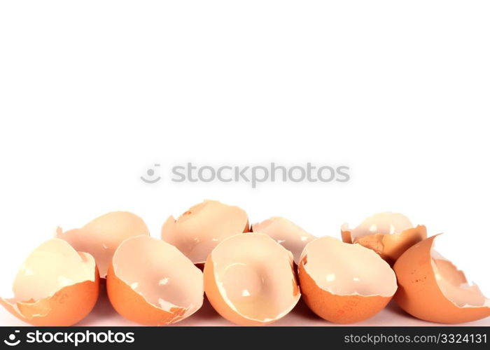 Broken egg shells on white background