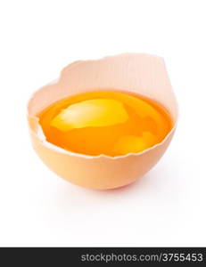 Broken egg with yolk on white background