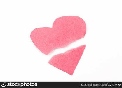 Broken heart shape made of pink paper