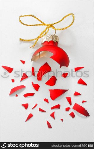 Broken Red Christmas tree ball isolated