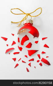 Broken Red Christmas tree ball isolated