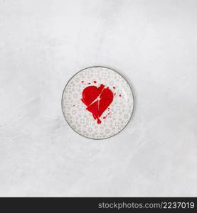 broken red heart plate