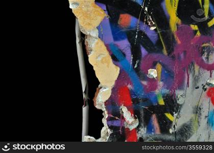 Broken wall with peeling smudged paint. Abstract graffiti colors background.